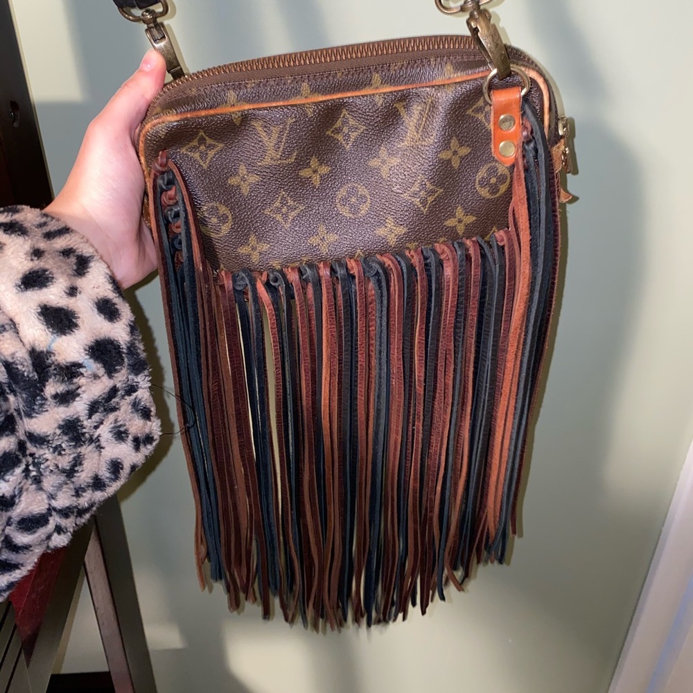 Fringed Louis Vuitton purse